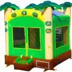 Grey and green castle-themed bouncy castle with pointed turrets, mesh sides, and a small entry ramp. Perfect for kids' events. Buy online in Canada.