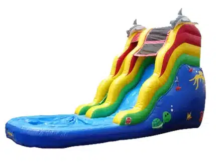 Ocean-themed inflatable water slide with dolphin accents, vibrant colors, and splash pool. Perfect for summer fun. Buy online in Canada today!