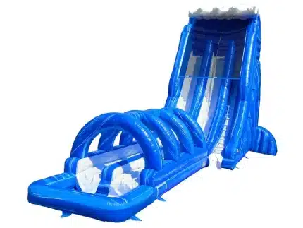 Massive wave-themed inflatable water slide with tunnel and splash pool, featuring a vibrant blue design. Perfect for events. Buy online in Canada!