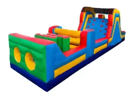 Colorful inflatable obstacle course with climbing wall, tunnels, and pop-up barriers. Perfect for parties and events. Buy online in Canada today!