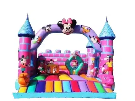 Pink Minnie Mouse-themed bouncy castle with vibrant colors, castle design, and fun characters. Perfect for kids' events. Buy online in Canada now!