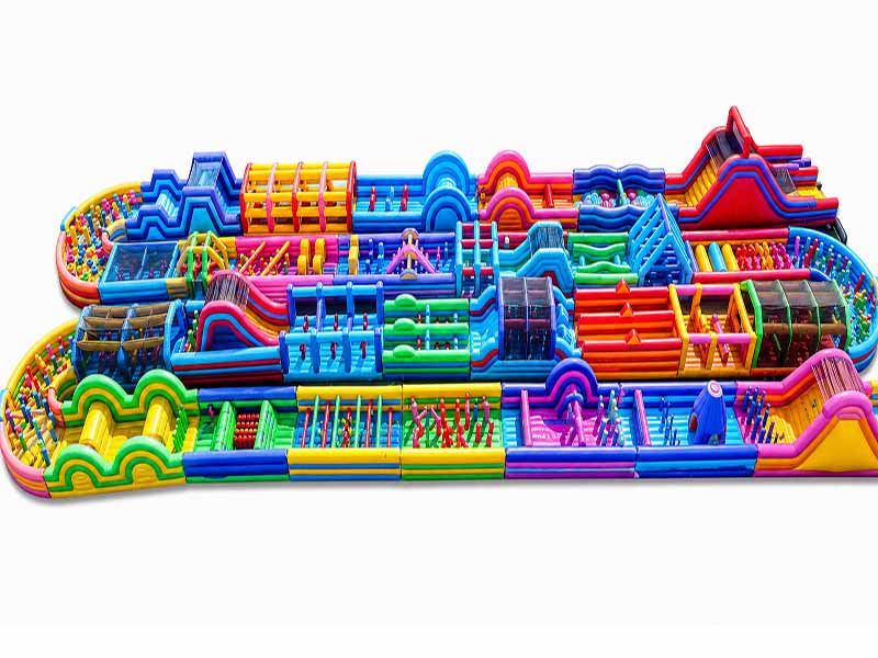 E110202 Rainbow Mega Inflatable Obstacle Course - Image 1